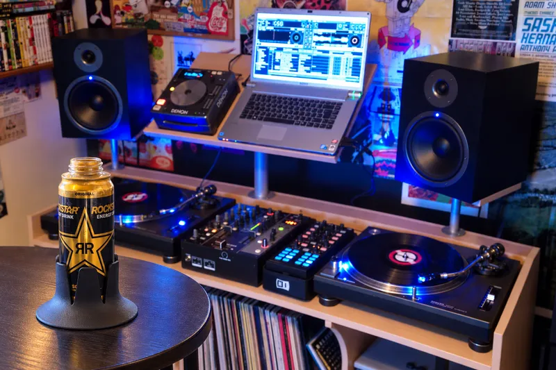 Steadi on a separate drink surface in a DJ setting. AI lifestyle illustration.